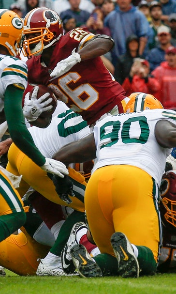 Peterson runs for 120 yards, 2 TDs, Skins top Packers 31-17